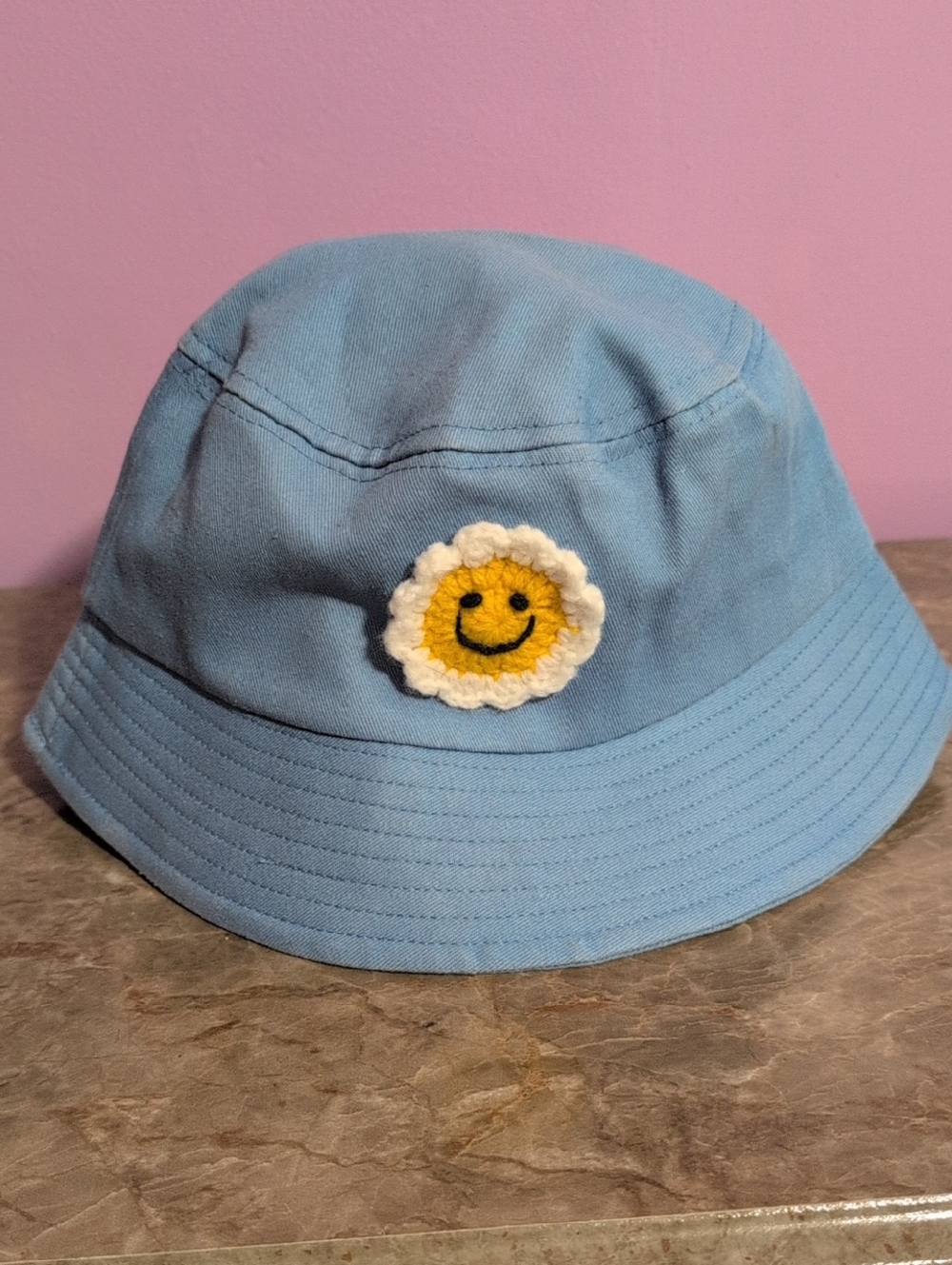 Light Blue Bucket Hat with Smiley Daisy Patch